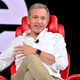 An image of former Disney CEO Bob Iger on stage at 2022's Code Conference is shown.